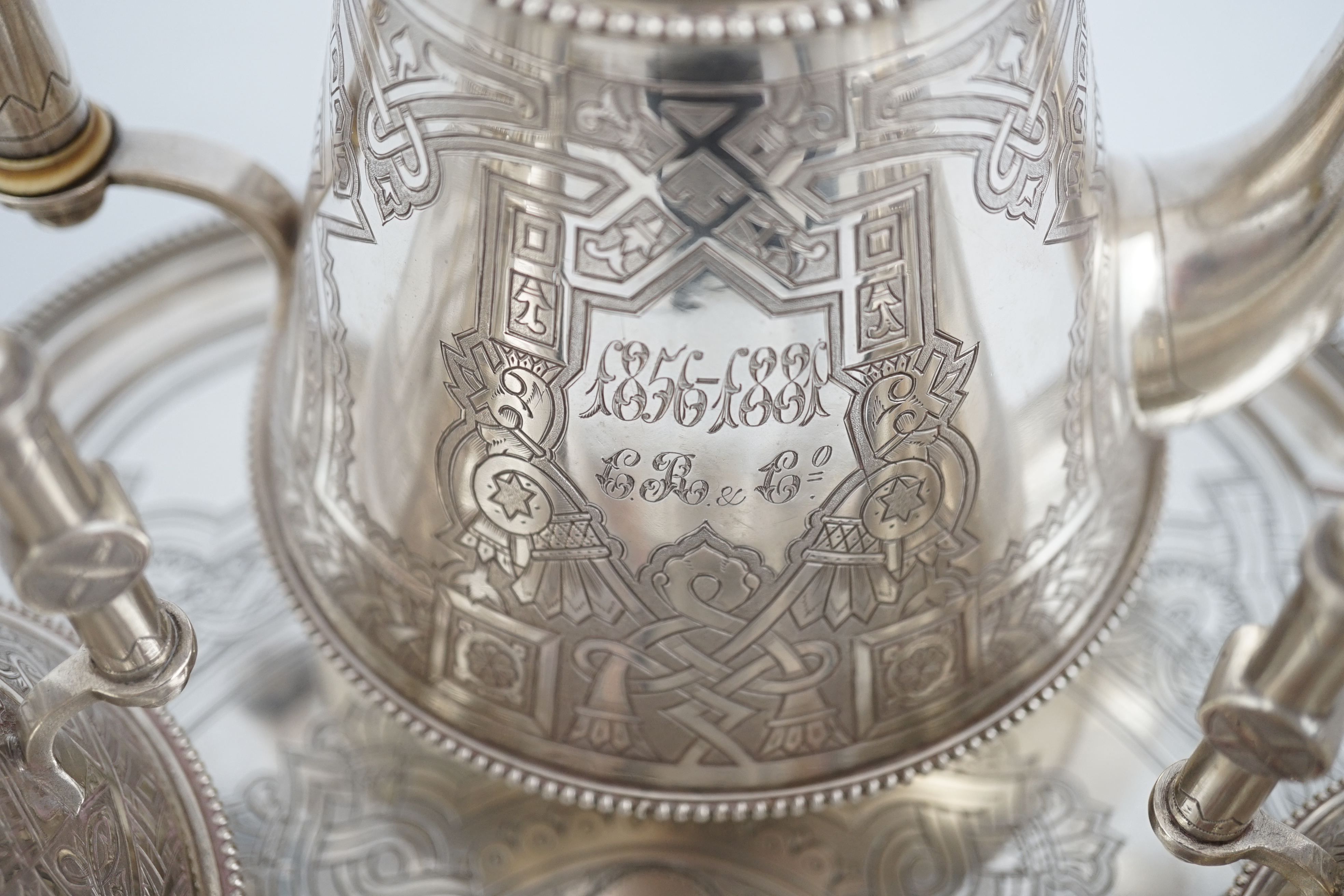 A late 19th century Russian three piece 84 zolotnik silver coffee set, with matching cusped circular tray, CITES submission reference: 6NJYTYTT